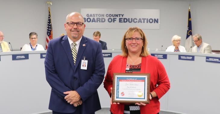 Grier Middle School principal Amy Holbrook pictured with Board Chairman Jeff Ramsey.